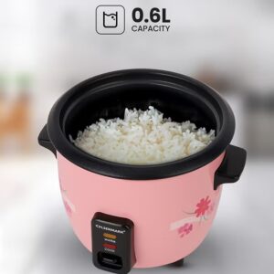 Olsenmark 0.6 L Multifunctional Rice Cooker With Non-Stick Inner Pot With Cool Touch Handle/Includes Cook And Keep Warm Functions, Equipped With Tempered Glass Lid, Rice Spoon, Plastic Inner Steamer And Measuring Cup 0.6 L 350 W OMRC2350H Pink/Silver - Image 5